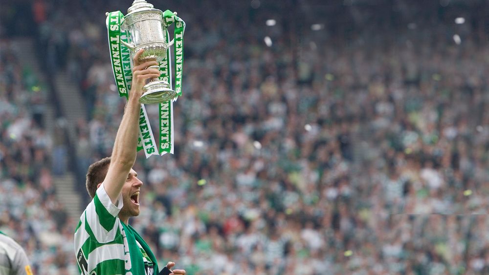 Stephen McManus holds aloft the Scottish Cup